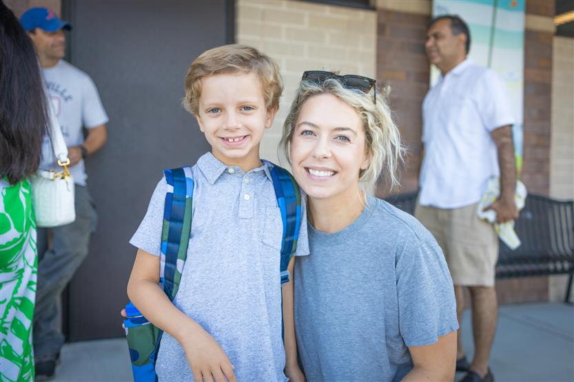 Two boys smile